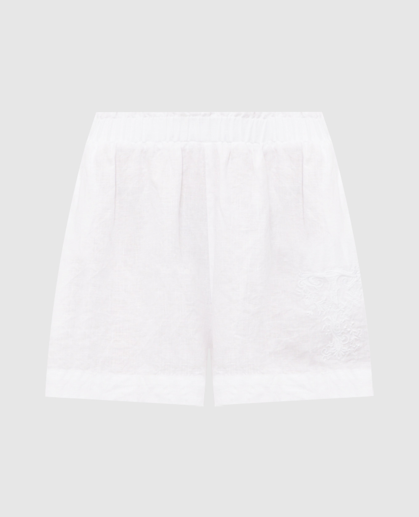 Білі шорти з льону