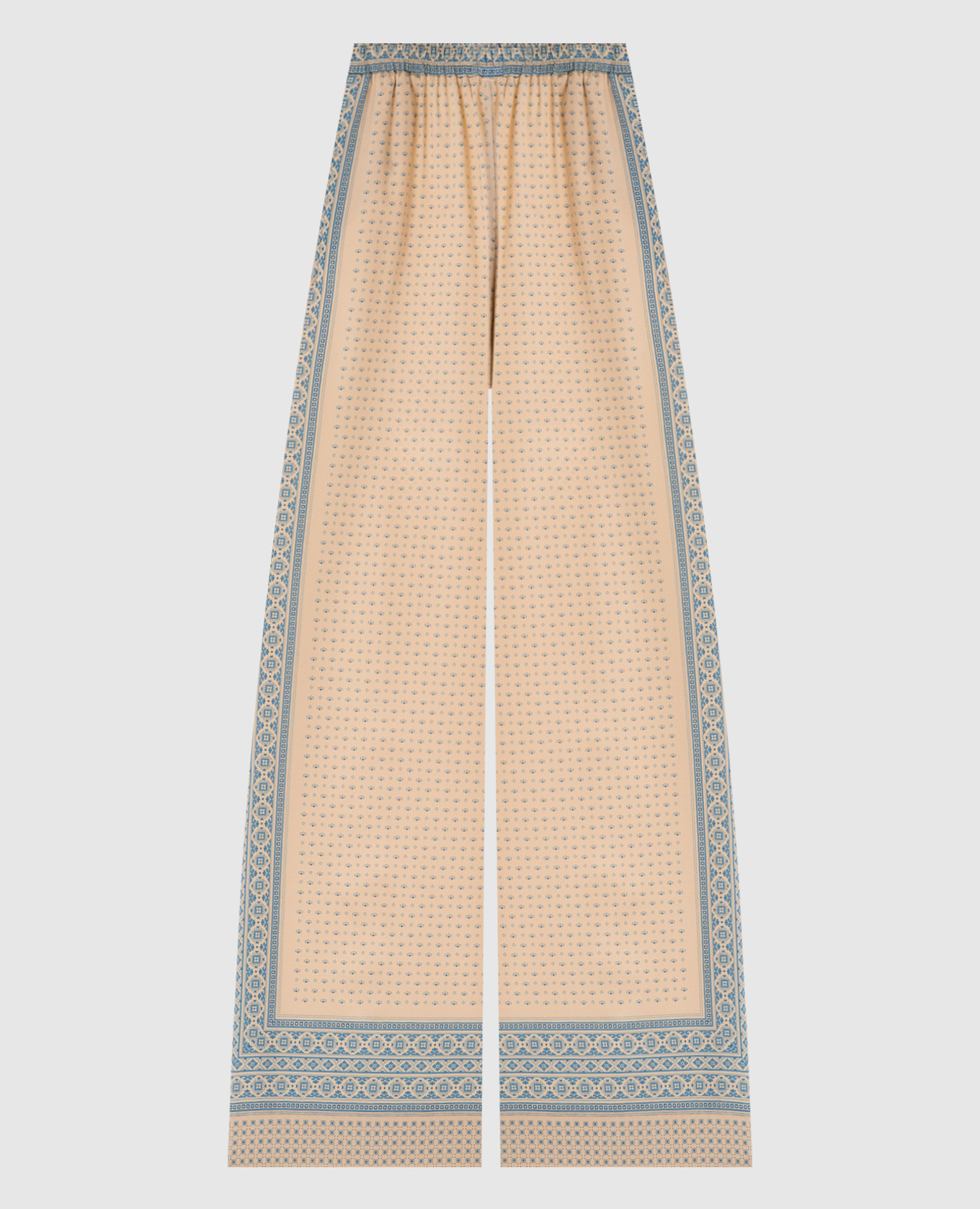 Бежеві штани із шовку в принт