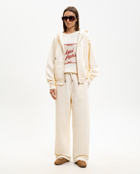 Ami Paris Спортивные штаны цвета айвори с эмблемой UTR855747w
