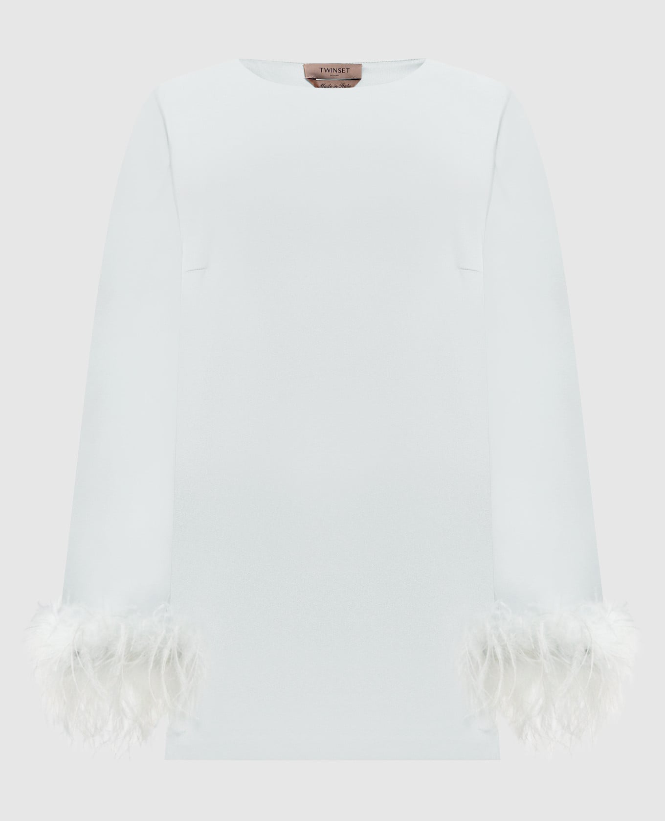 Зеленая блуза с перьями страуса