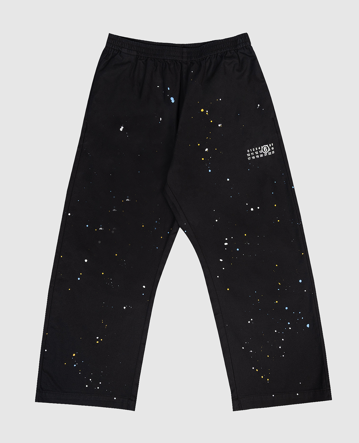 Детские черные брюки в принт в виде пятен краски