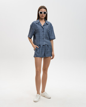 AMIRI Синие шорты из шелка в принт монограммы логотипа AWSHCA1021