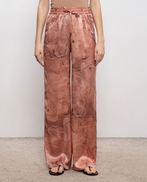 Kiton Розовые брюки из шелка в цветочный принт D48122K0873G