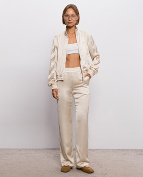 Off-White Бежевые спортивные брюки с кружевом 2FH00650B
