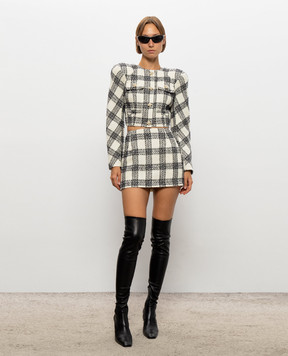 Vetements Укорочений твідовий жакет з акцентними плечима WH27JA025WC