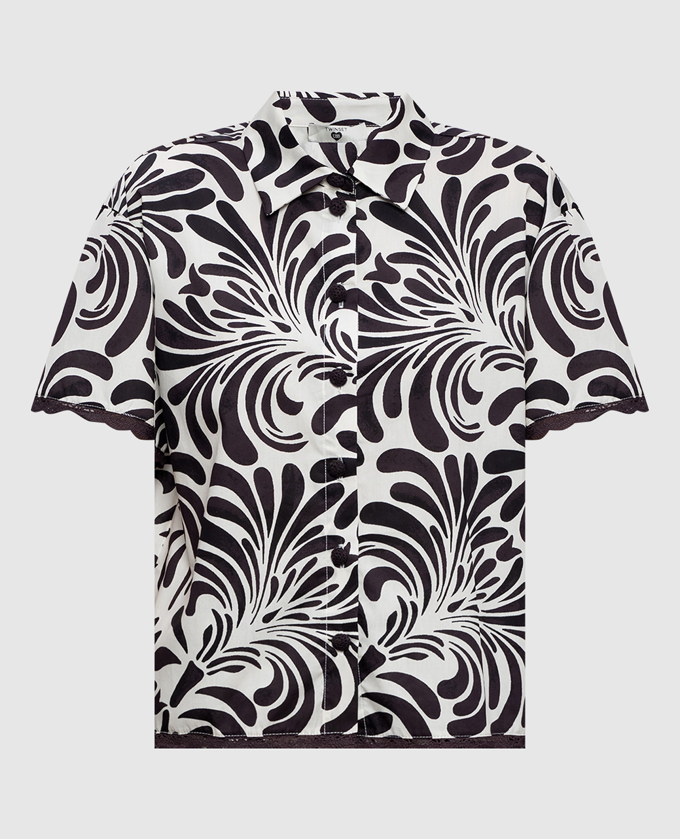 Бежевая рубашка в контрастный принт