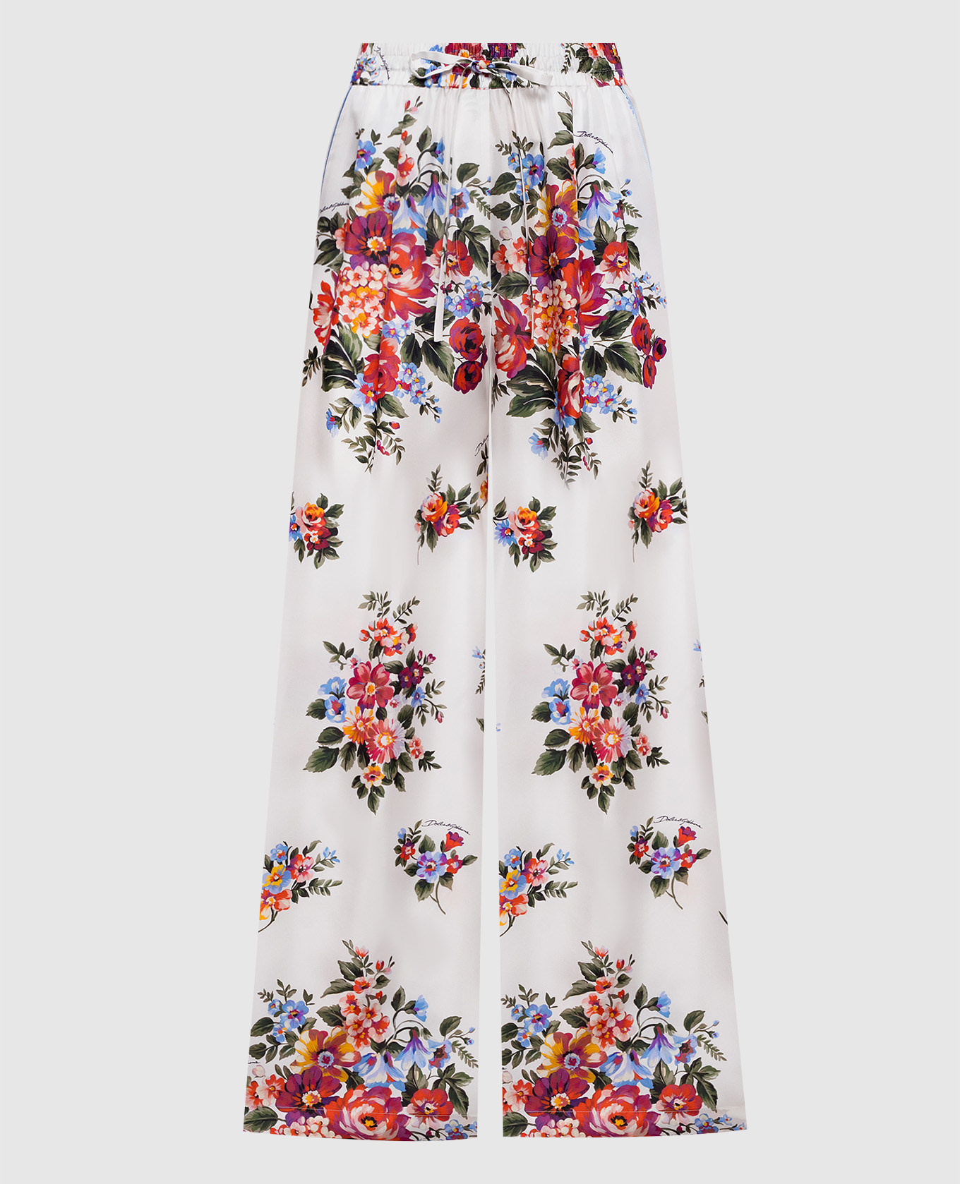 Белые брюки из шелка в принт