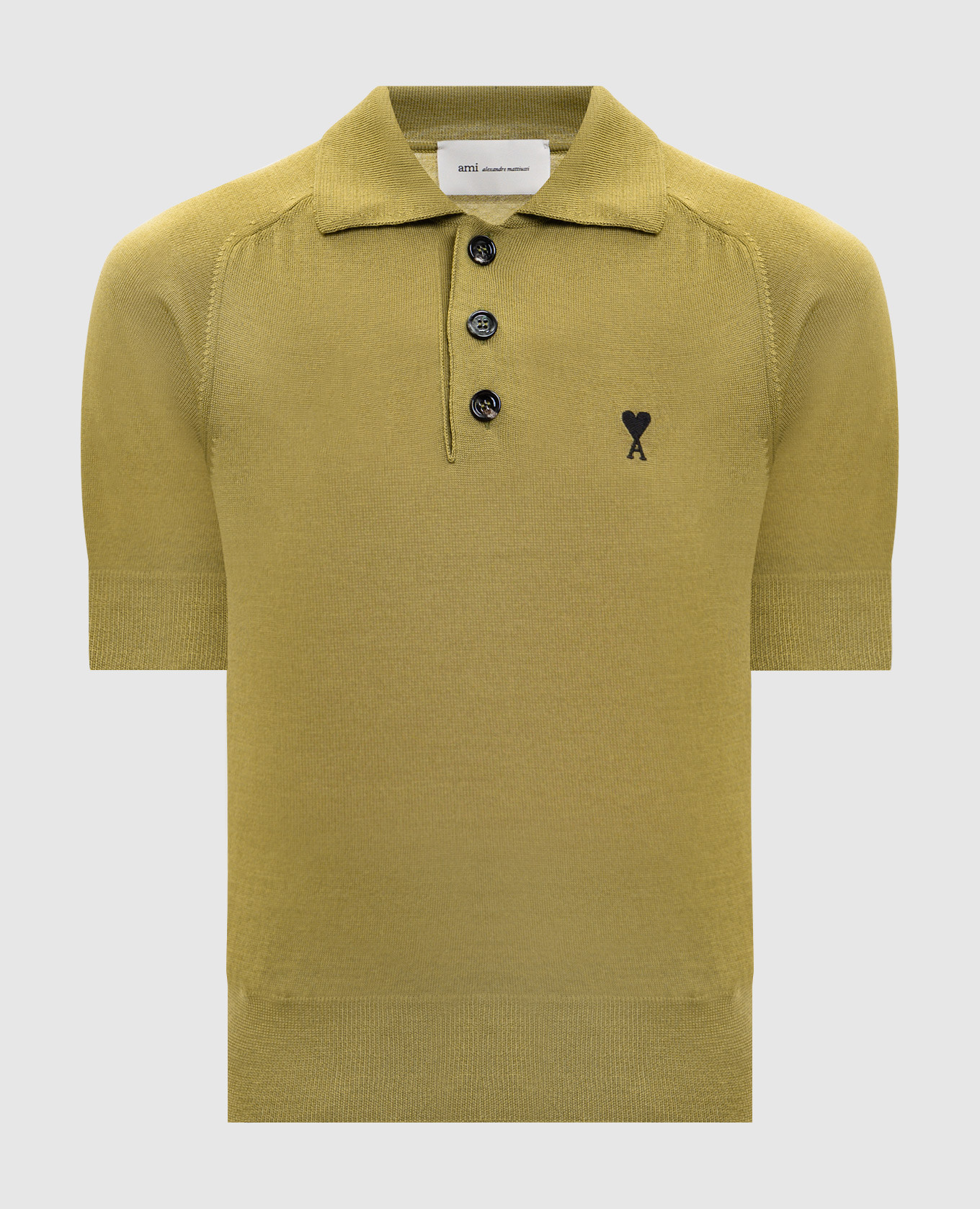 Зеленое поло из шерсти мериноса