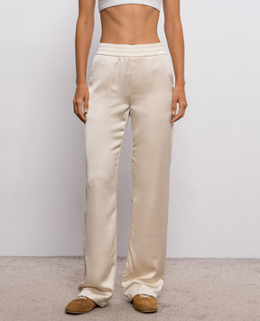Off-White Бежевые спортивные брюки с кружевом 2FH00650B
