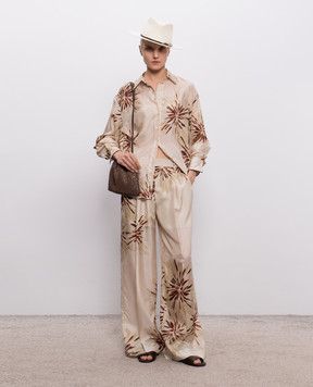 Brunello Cucinelli Бежеві штани із шовку в квітковий принт MQ967P9229