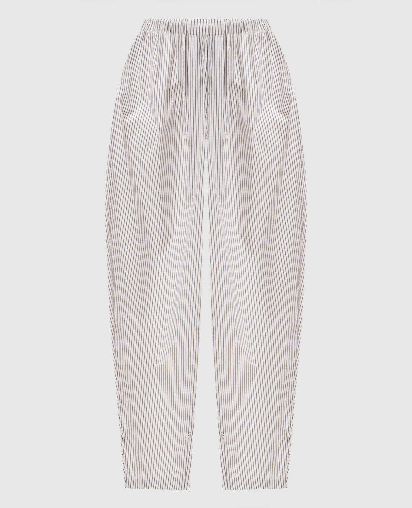 Білі штани в смужку